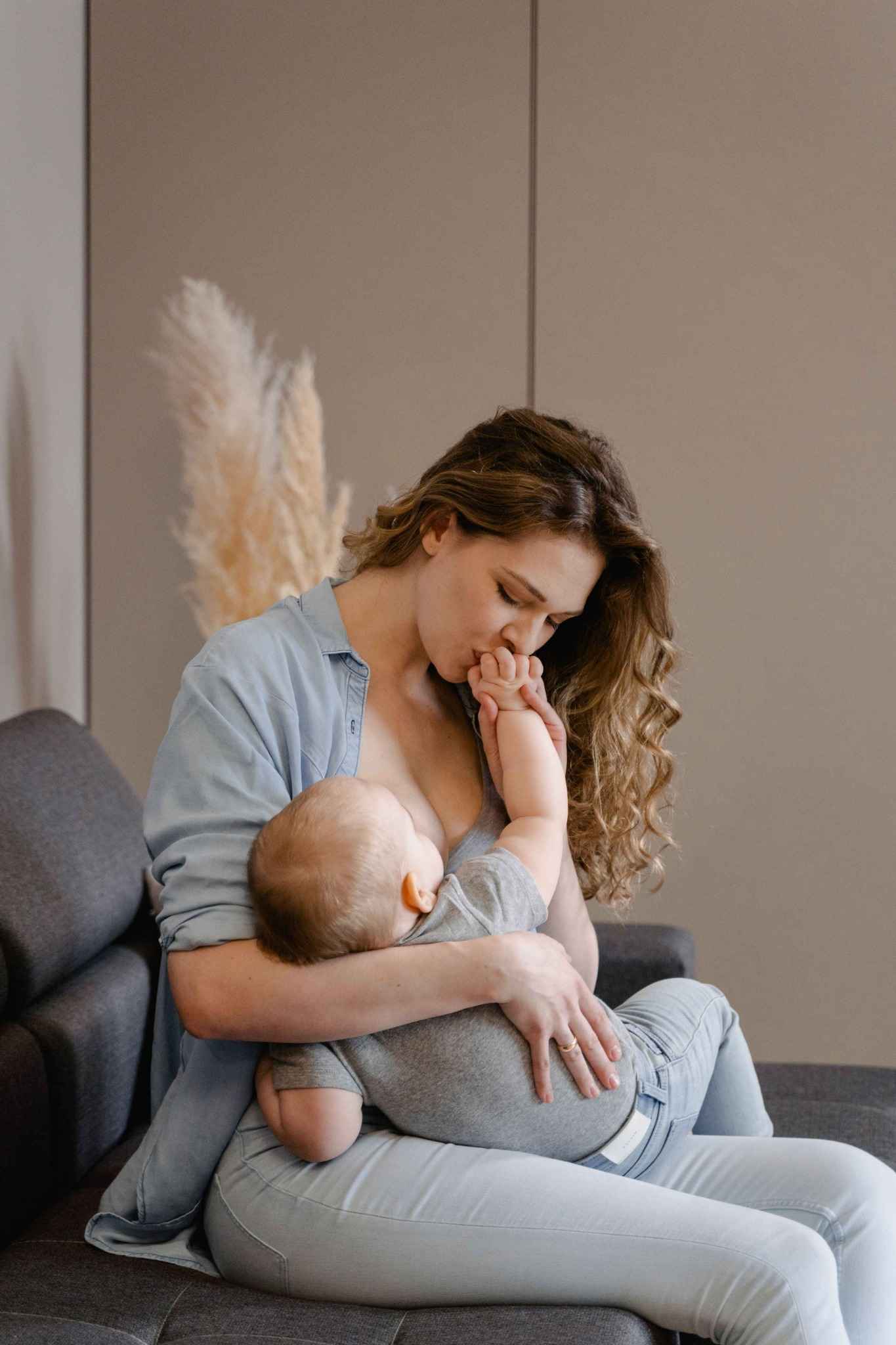 Mother gently night-weaning her toddler using a holistic baby sleep attachment-based approach